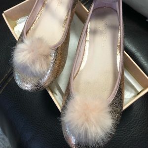 Girls rose gold flats w/ fluffy Pom.